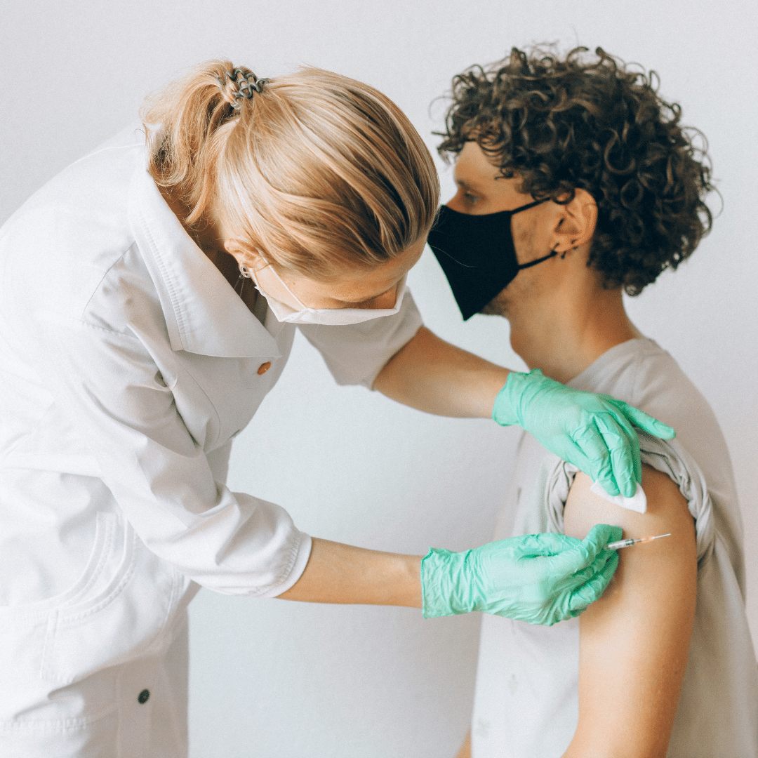 A walk in patient receiving vaccination